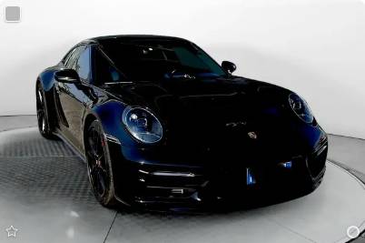 Black Porsche 911 (992) Carrera S, front three-quarter view