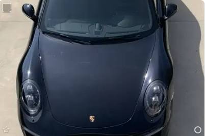 Dark blue Porsche 911, front view